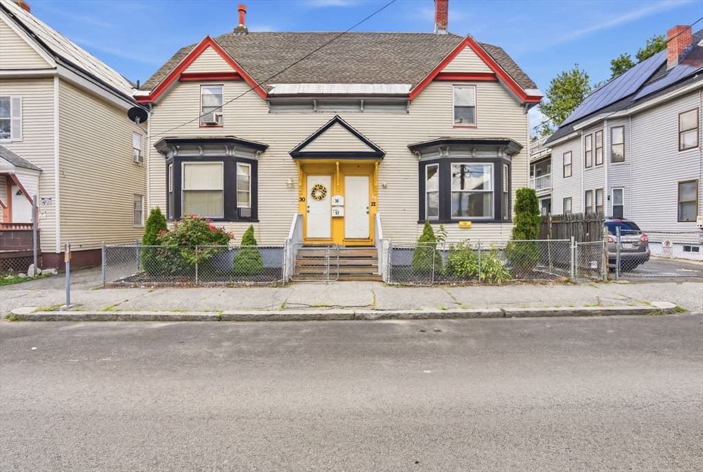 Multifamiliar de 7 quartos em 30-32 Washington St, Lawrence